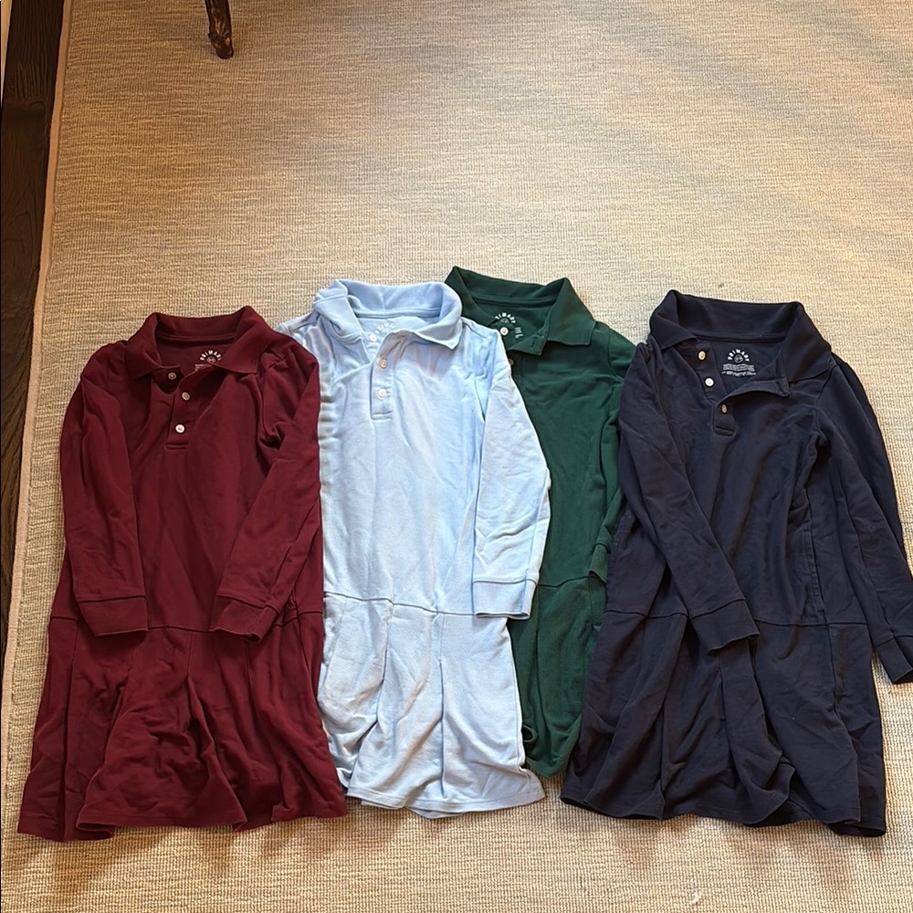 Set of Four Primary Polo Dresses in Plum, Light Blue, Green, and Navy